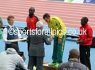 Jimmy Alder presents Michael Shelley (Australia) with his gold medal after winning the marathon, 2014 Commonwealth Games, Glasgow. Photo: David T. Hewitson/Sports for All Pics